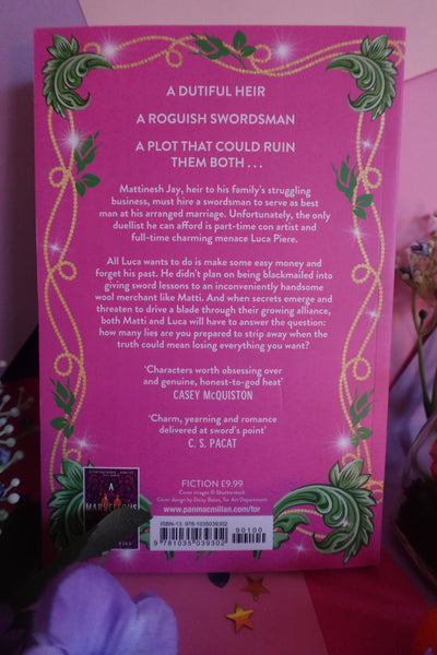 The backcover of Swordcrossed by Freya Marske